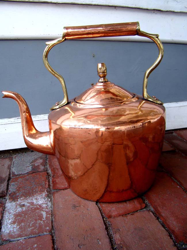 A fine early Victorian brass and copper kettle circa 1840